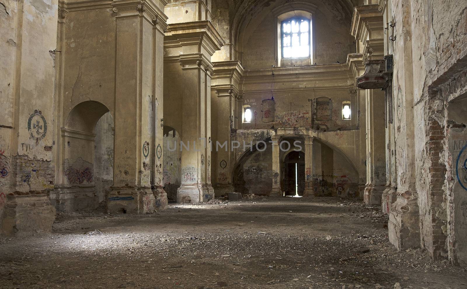 indoor shot of a church in ruins