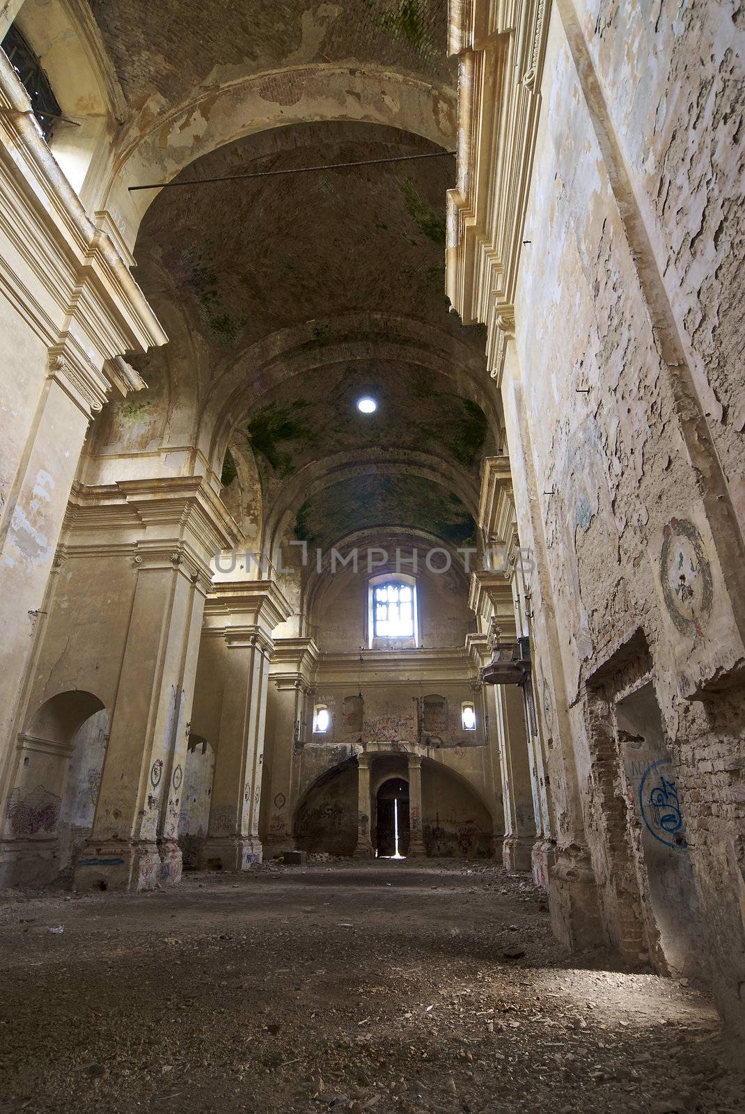 indoor shot of a church in ruins