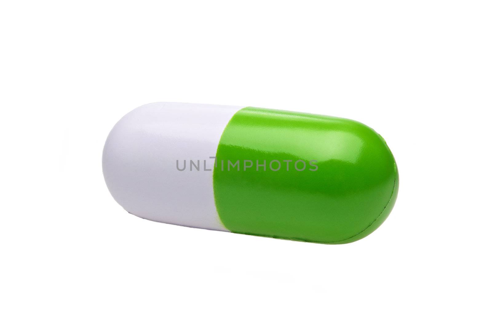 Pill shaped anti-stress toy isolated on white background