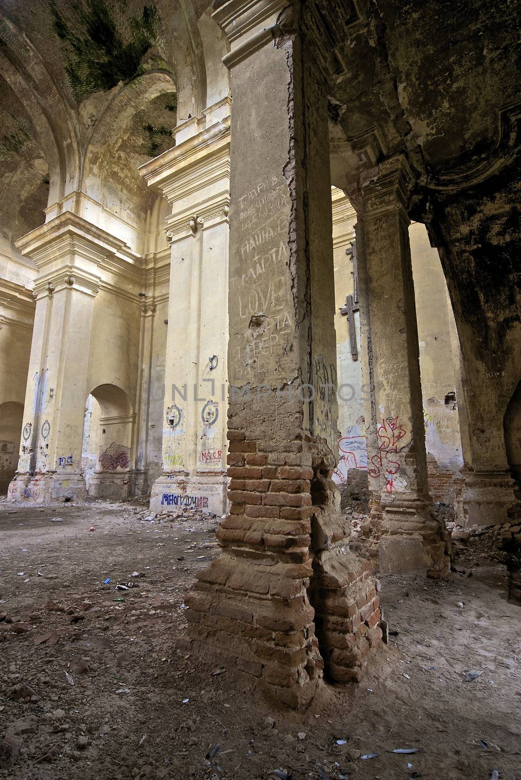 indoor shot of a church in ruins