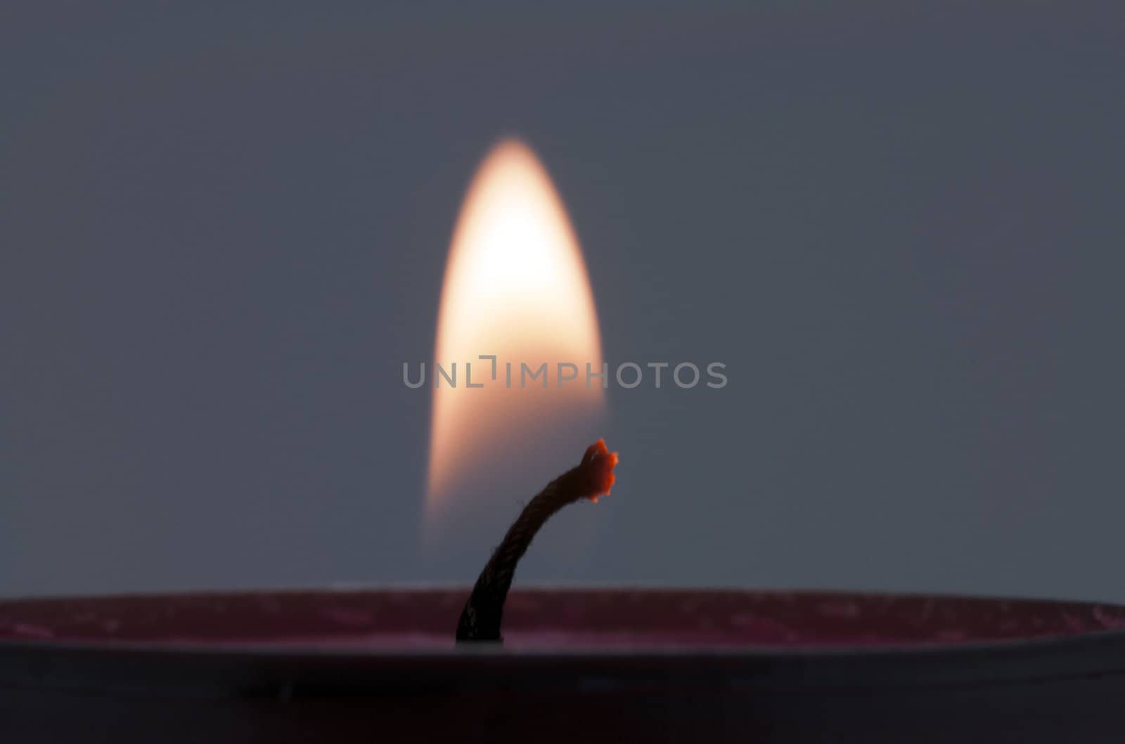 yellow white candle light with dark background