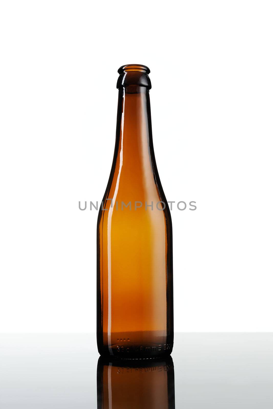 Empty bottle of beer isolated on white background.