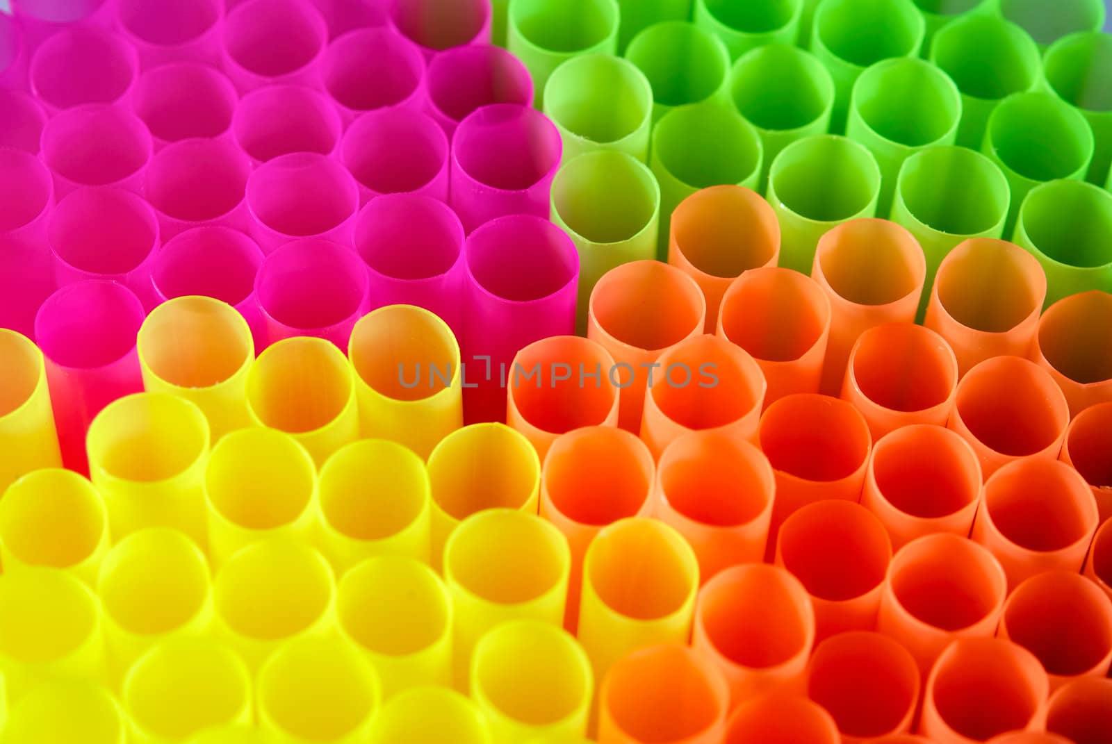 Abstract background from many multi-colored tubules for a cocktail