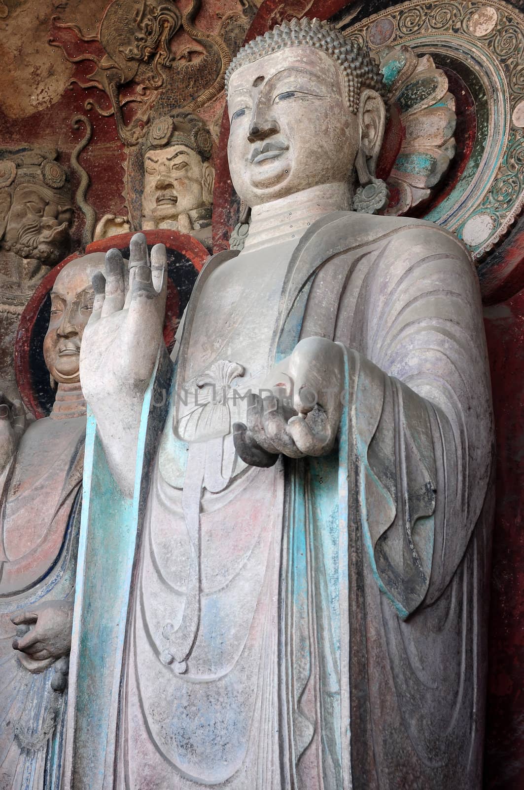 Ancient buddha statue in caves in Sichuan, China