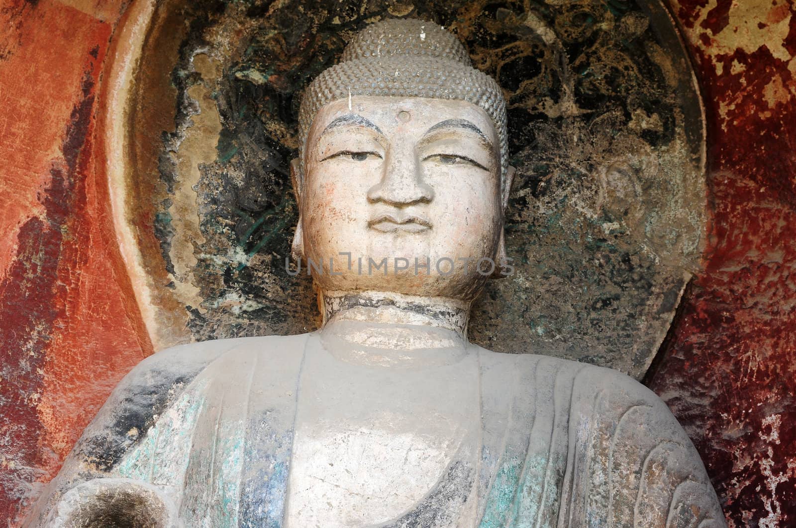 Ancient buddha statue in caves in Sichuan, China