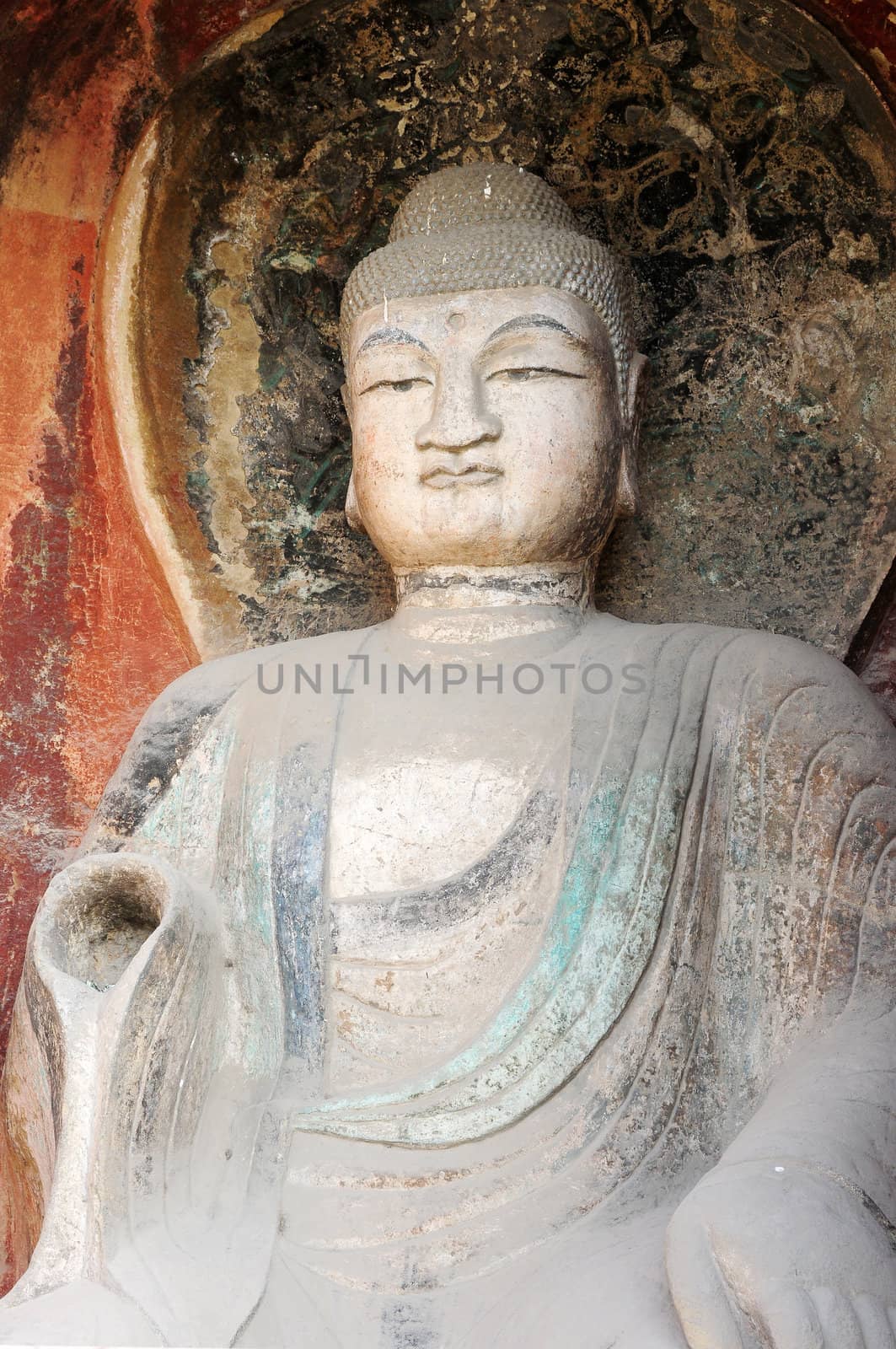 Ancient buddha statue in caves in Sichuan, China