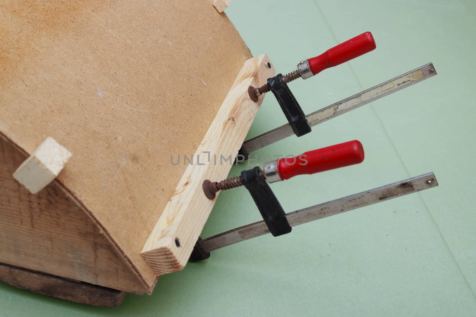 Clamps are used for gluing  workpiece of fiberboard