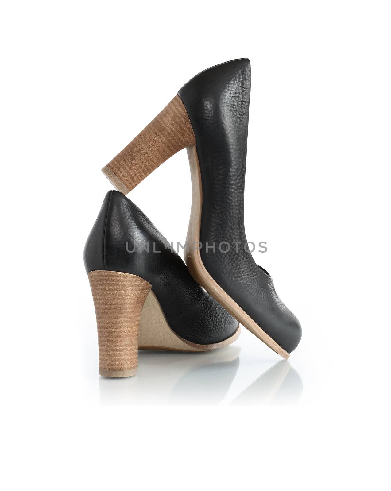 Pair black leather woman�s shoes with high heel on white background. Isolated with clipping path