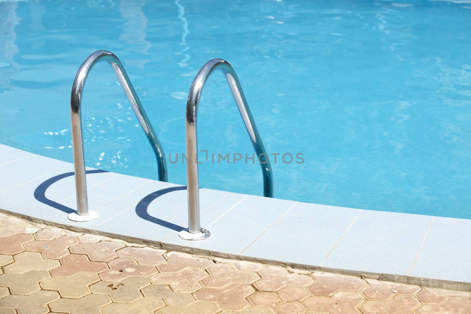 Handrail of the public swimming pool. Horizontal photo