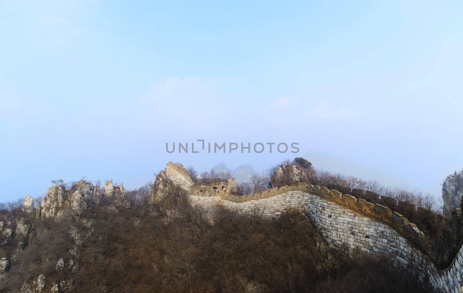 ruins of great wall of china on a foggy day