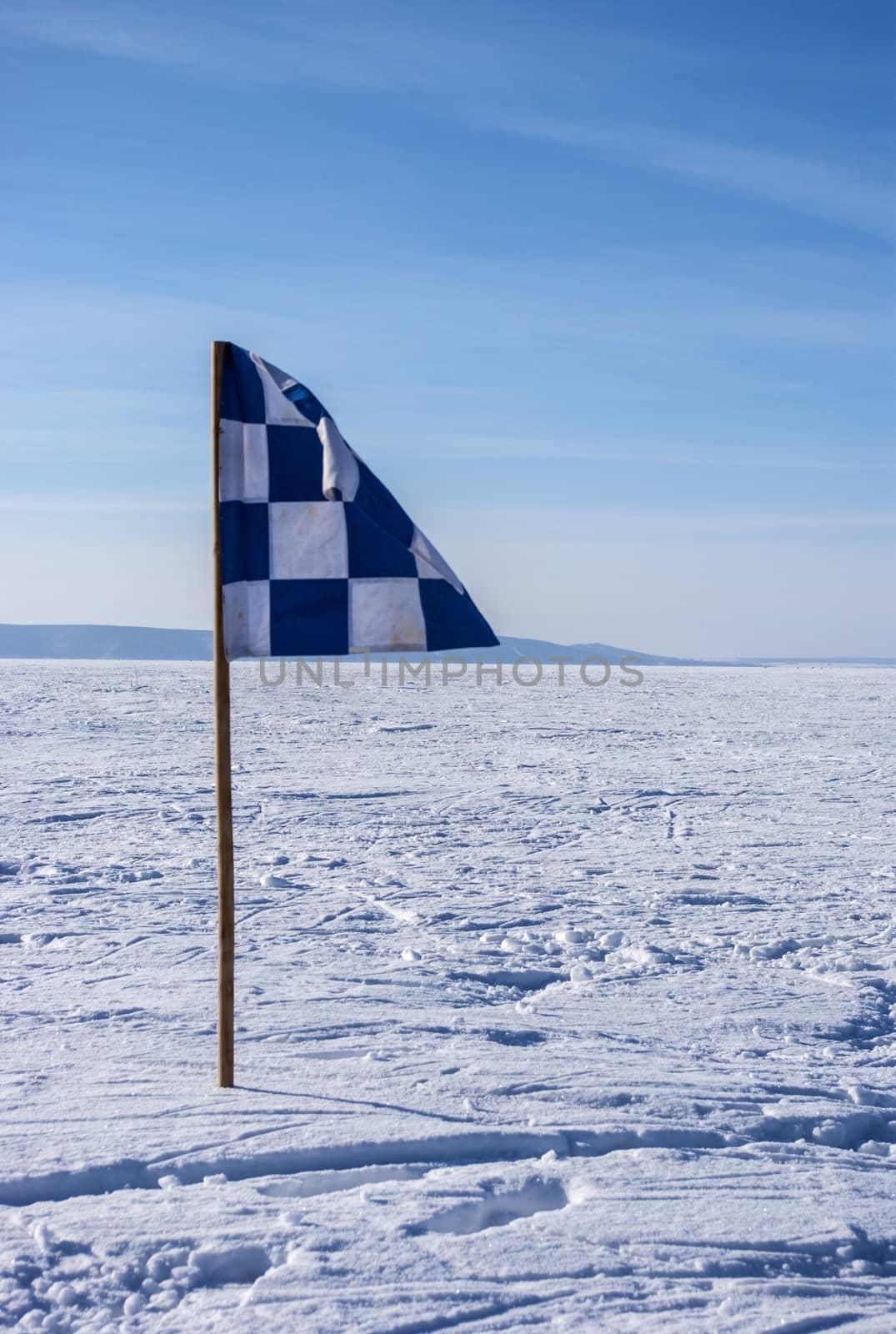  snowy field of sports with a flag