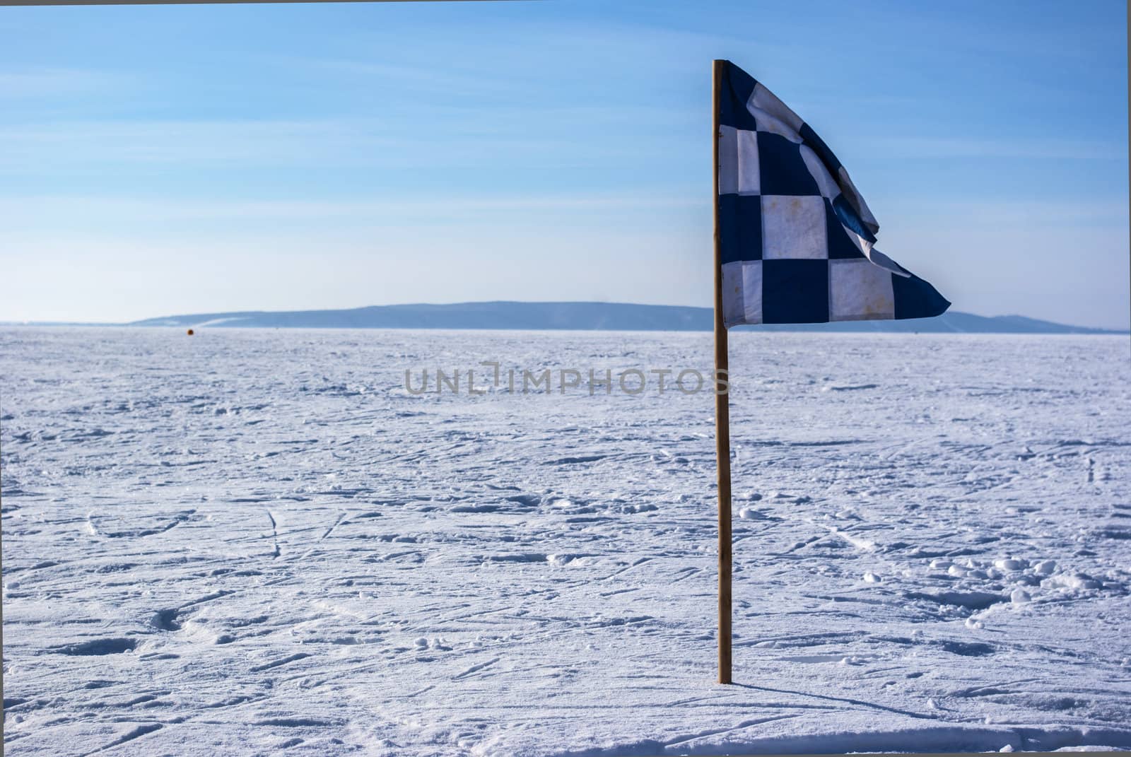  snowy field of sports with a flag
