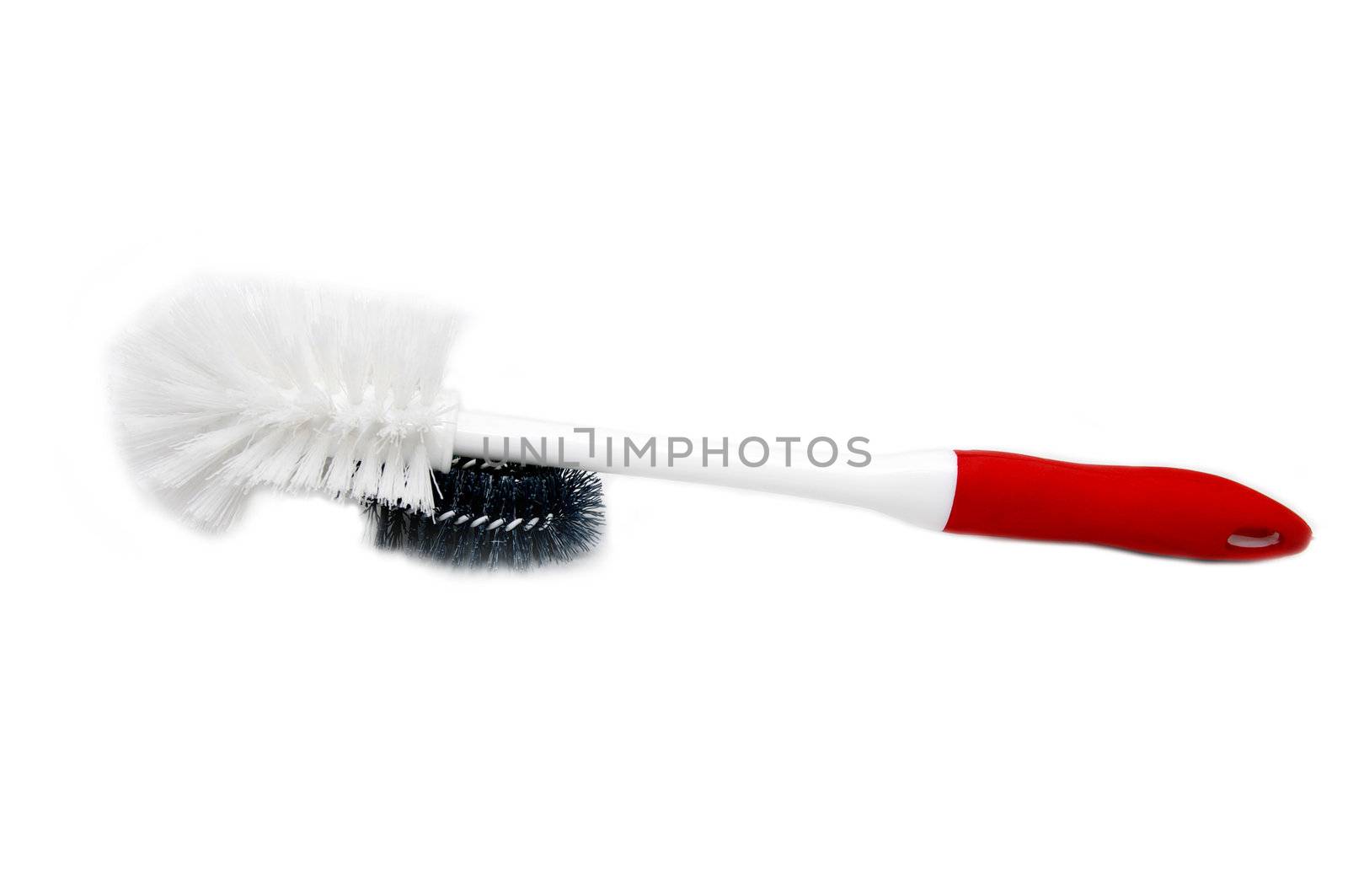 round brush for a toilet bowl with a red pen on a white background
