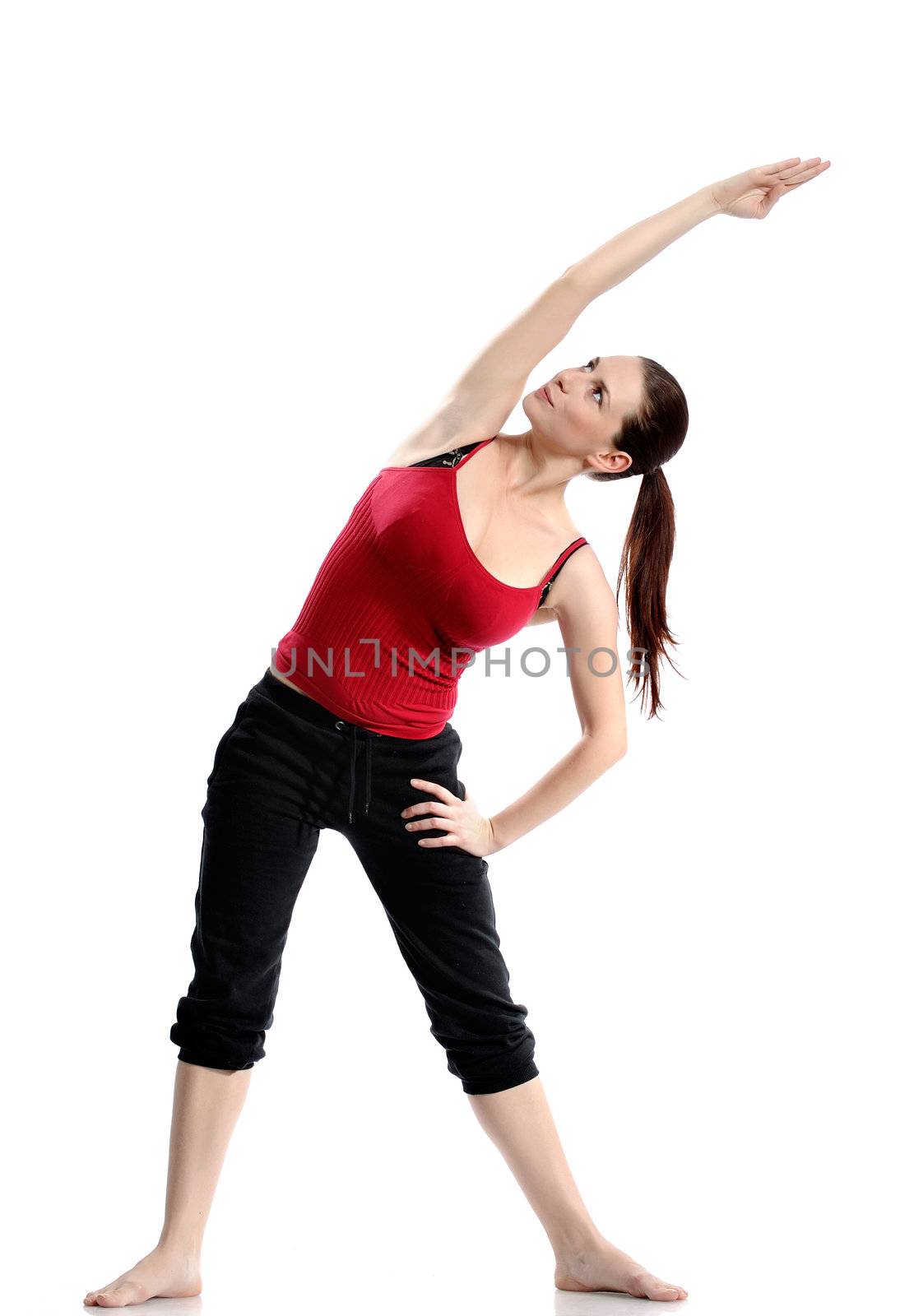 Girl in sportswear doing sport exercises. Isolated over white background.