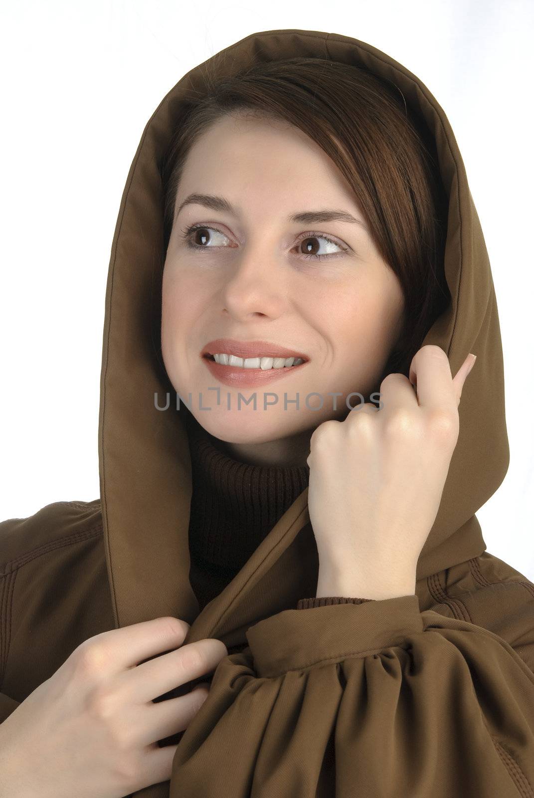 Cheerful young woman holding her hood by kirs-ua