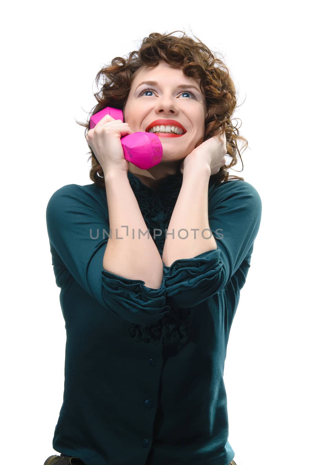 Young woman holding handset. Isolated on white