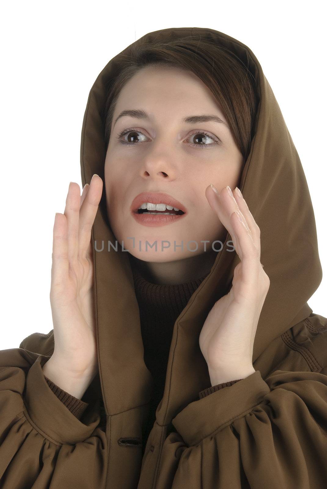 Young woman in a hood colling