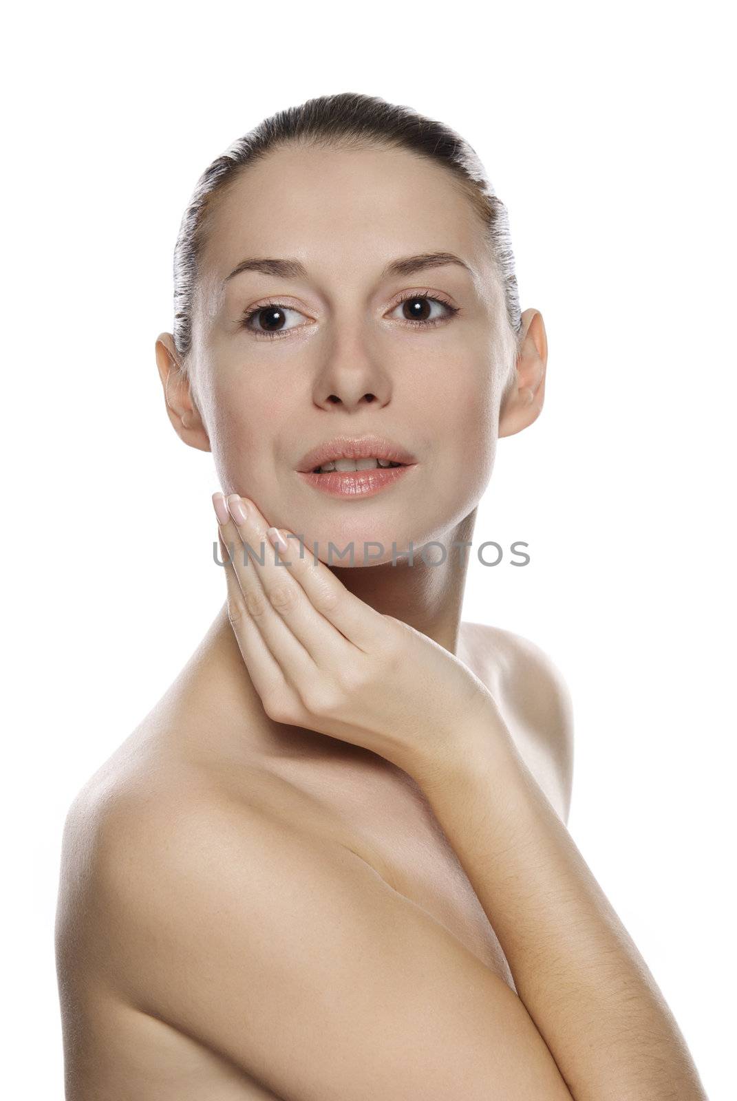 Portrait of young beautiful serene girl with healthy complexion. Isolated on white background