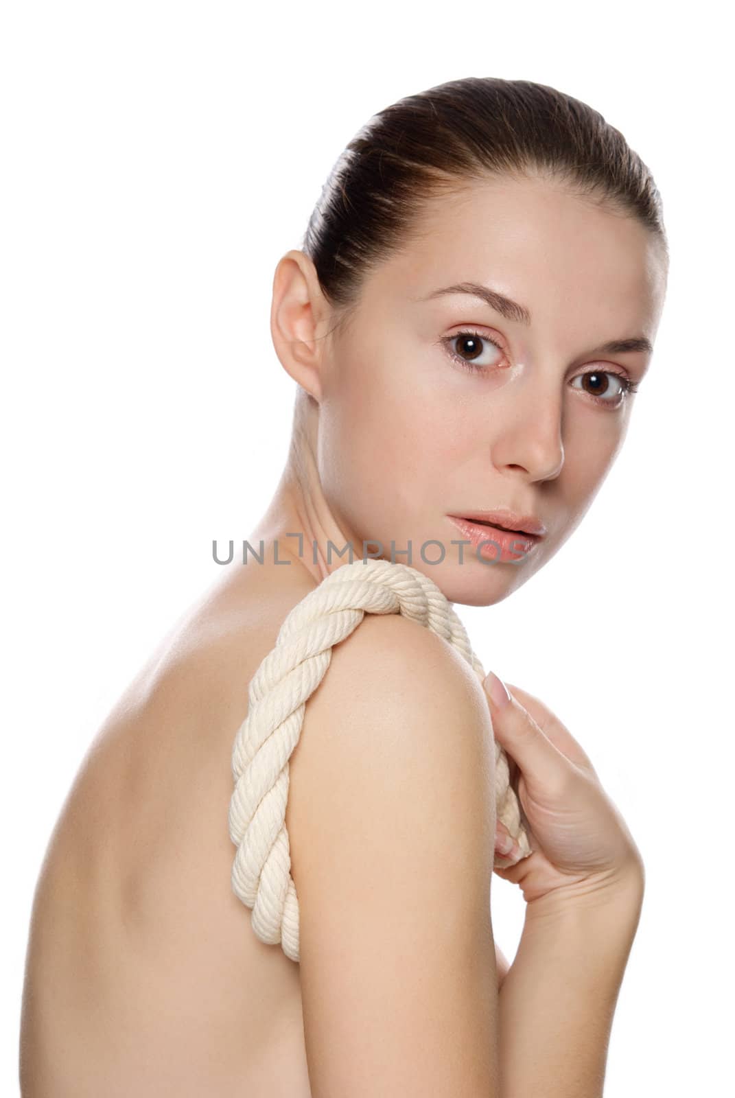 Portrait of young beautiful woman with a thick rope. Isolated on white background