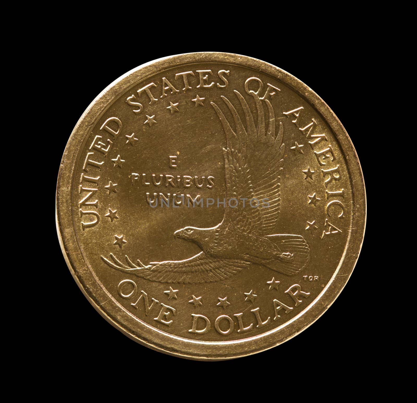 Macro front view of the eagle on a USA one dollar coin isolated against black
