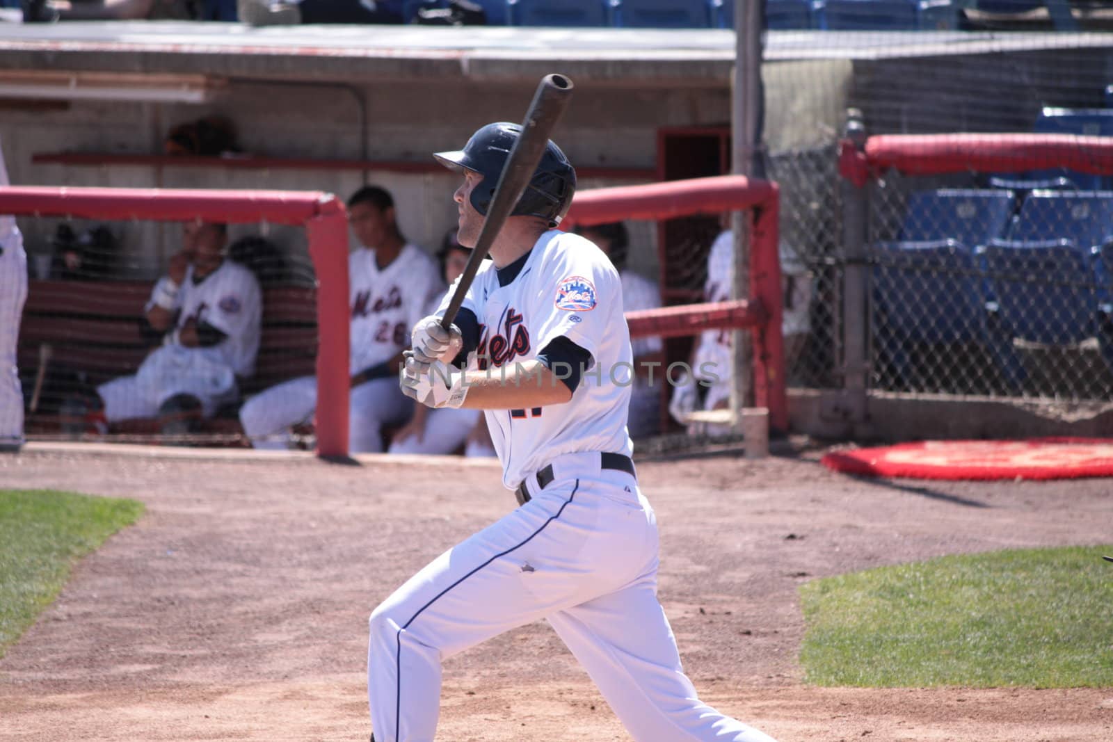 BINGHAMTON, NY - JUNE 14: Binghamton Mets Eric Campbell takes a swing and watches his hit against the Reading Phillies at NYSEG Stadium on June 14, 2012 in Binghamton, NY