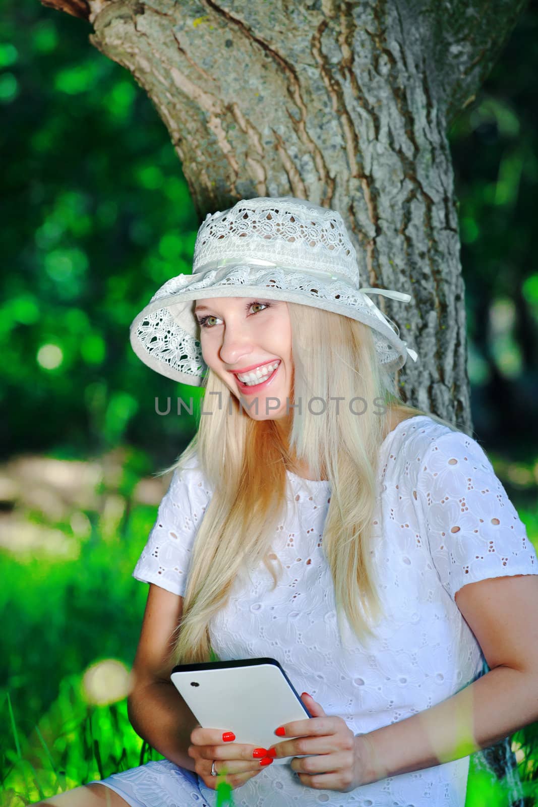 Beautiful girl with a Tablet PC by fogen