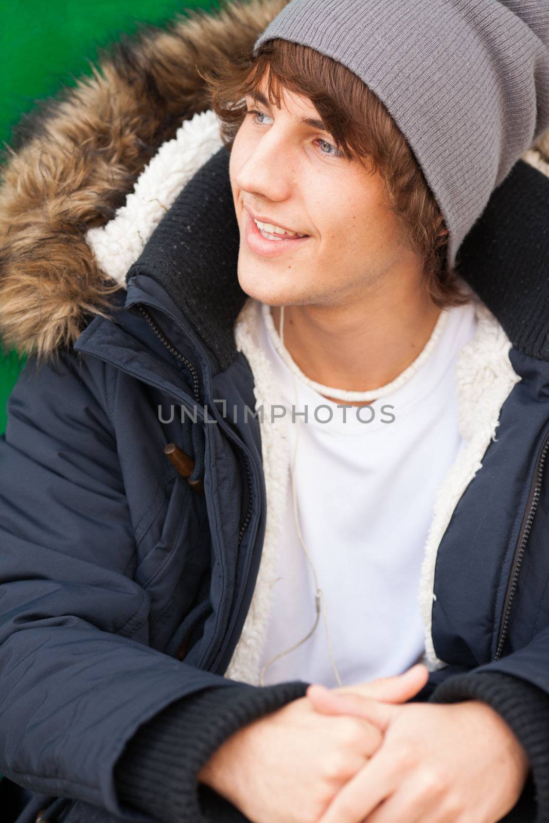 young handsome man portrait with headphones by Lcrespi