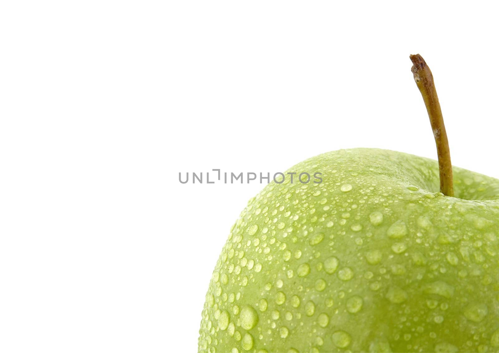 Green apple with water drops