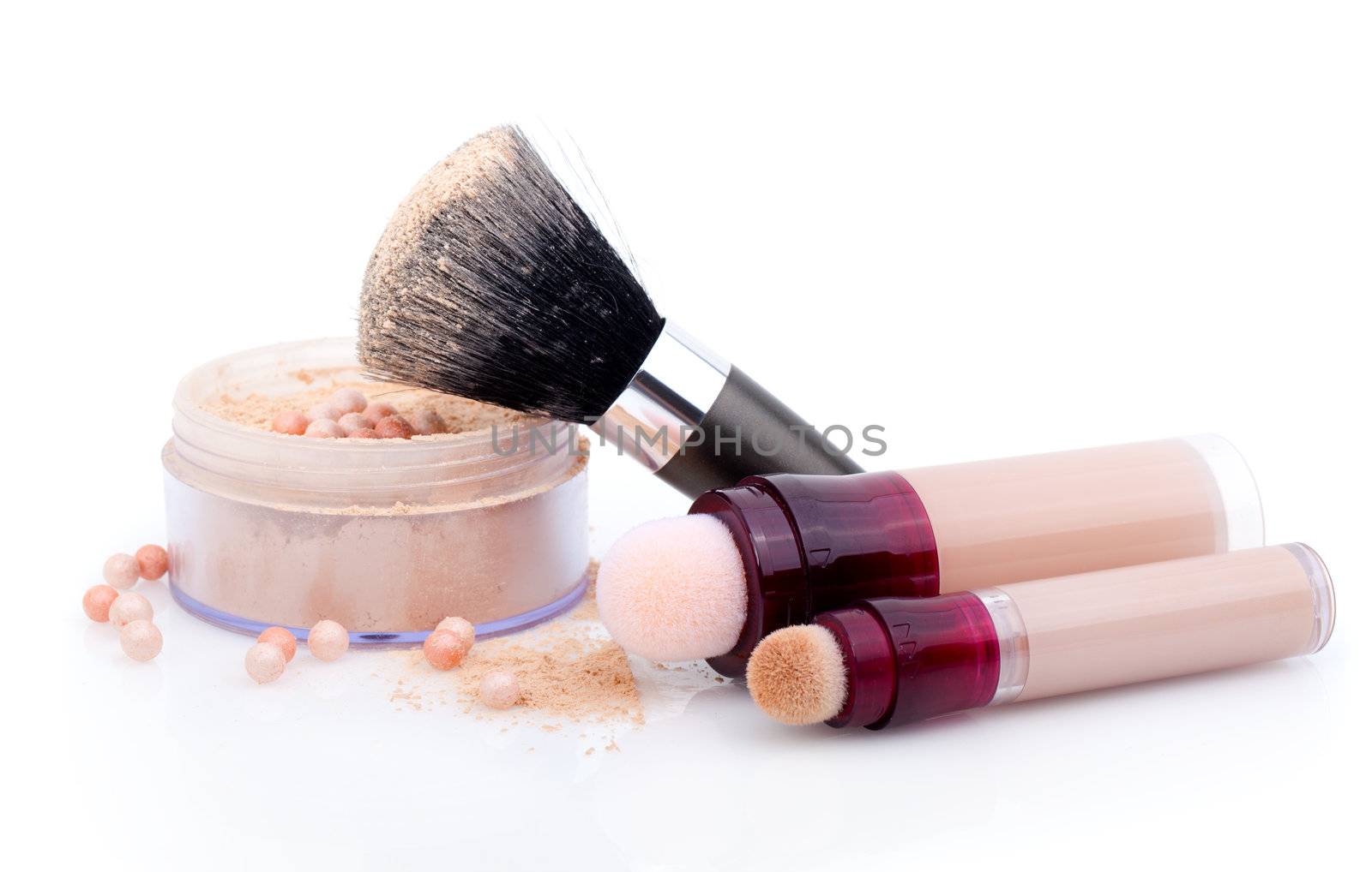 powder with cosmetic brush, on the white background