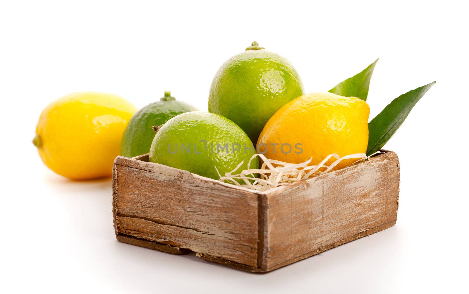 yellow and green lemon over white background.