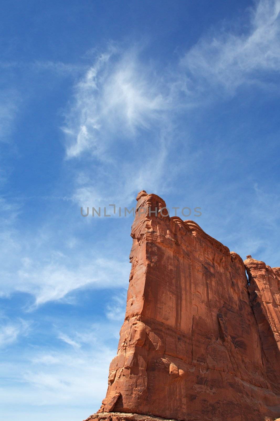 Courthouse Towers Ridge in Arches National Park with dramatic Blue Sky