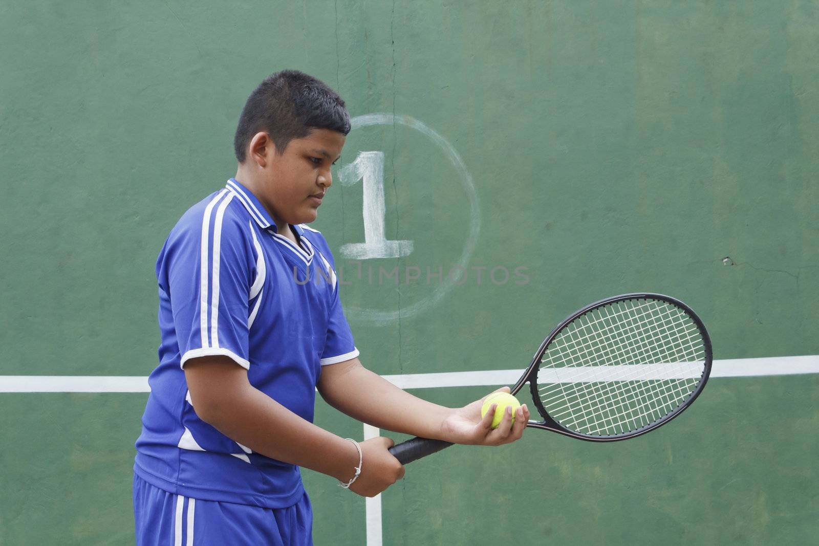 Thai boy tennis player learning how to preparing to play tennis