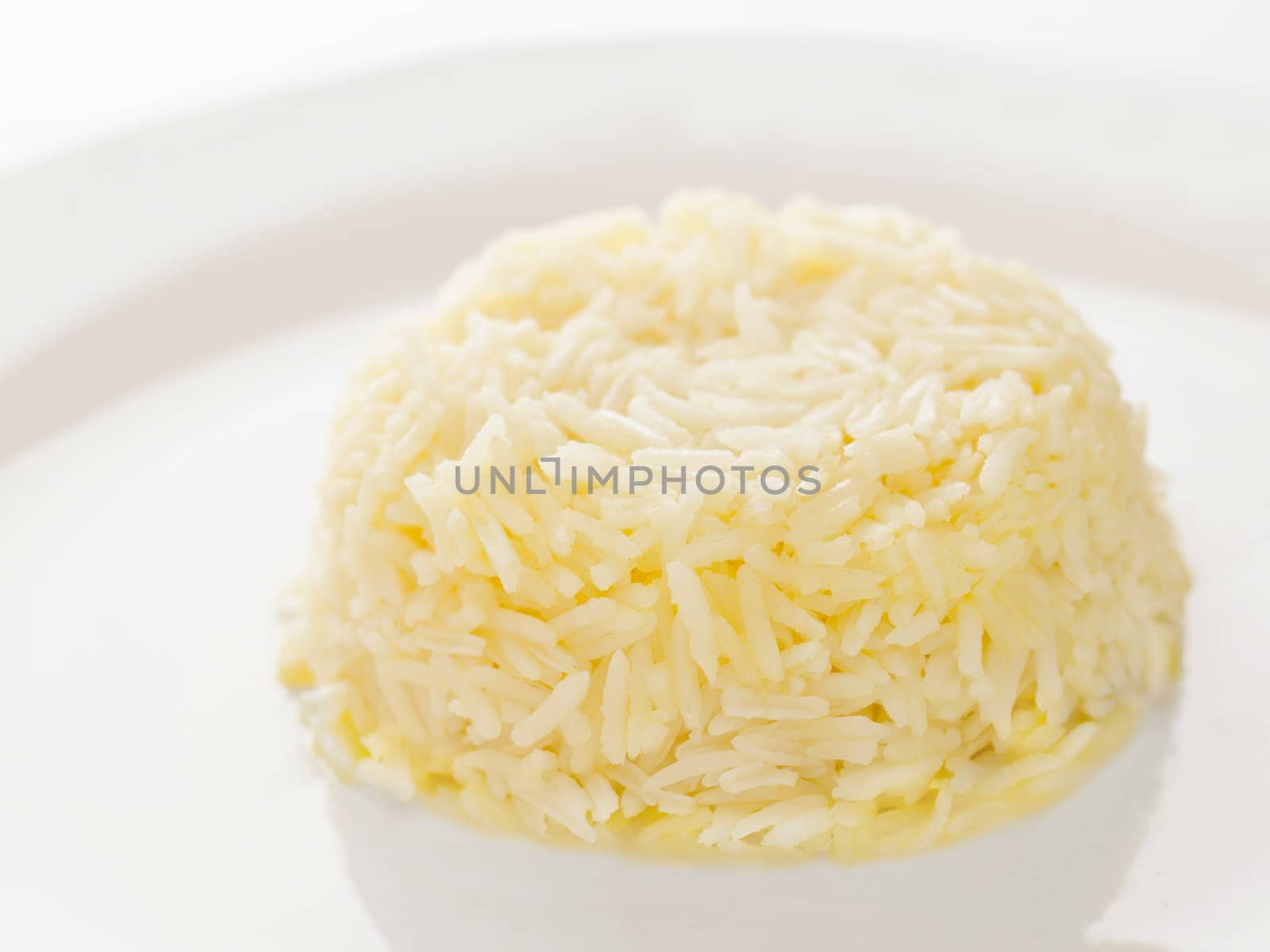 close up of a plate of buttered rice