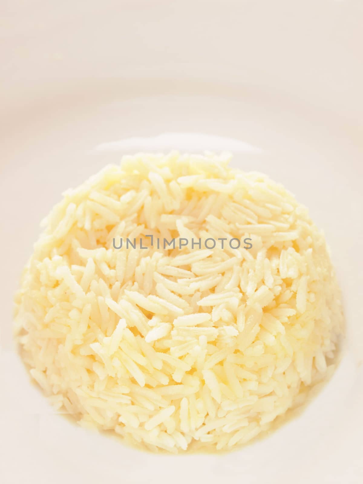 close up of a plate of buttered rice