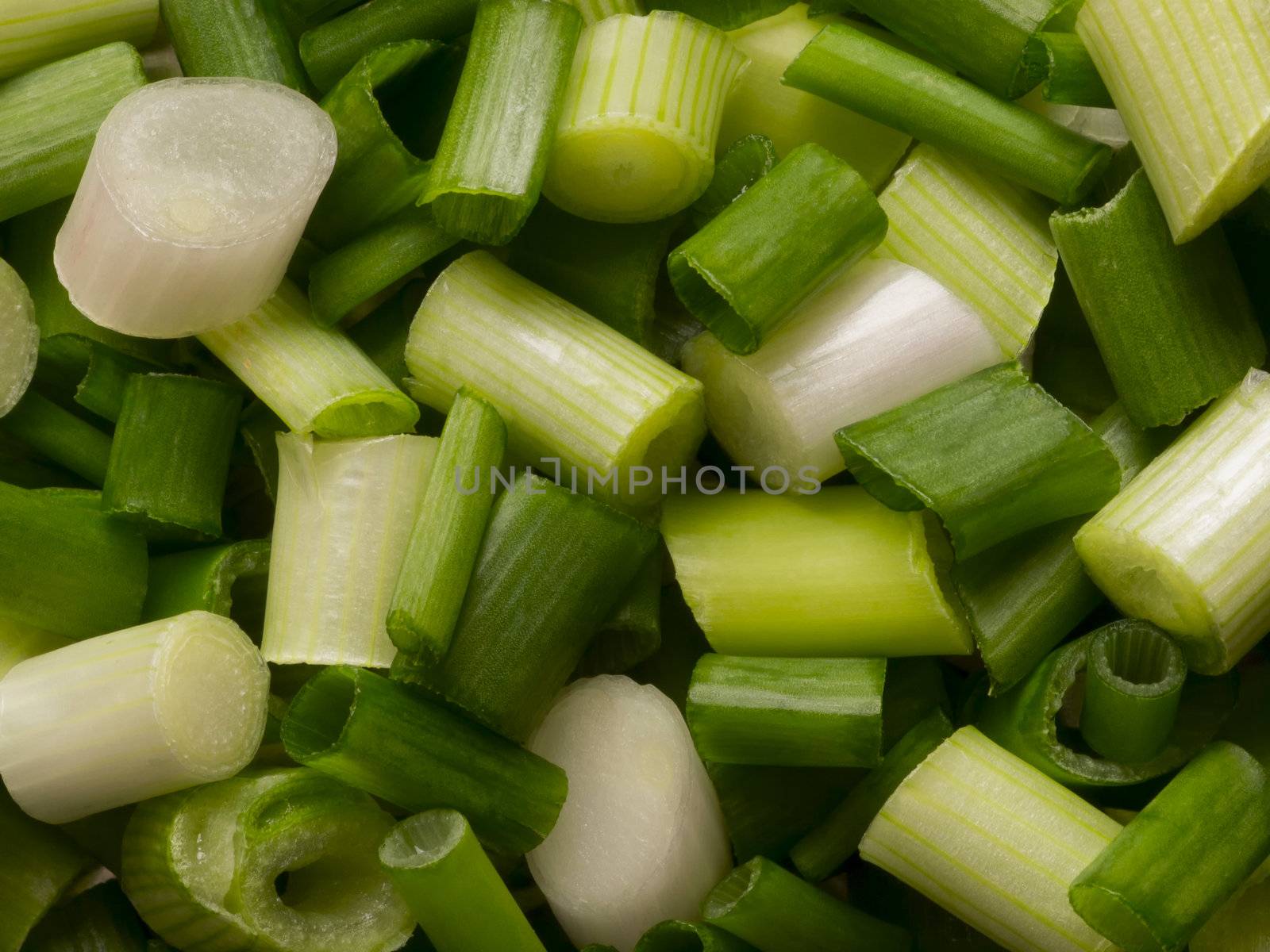 close up of chopped green onions food background