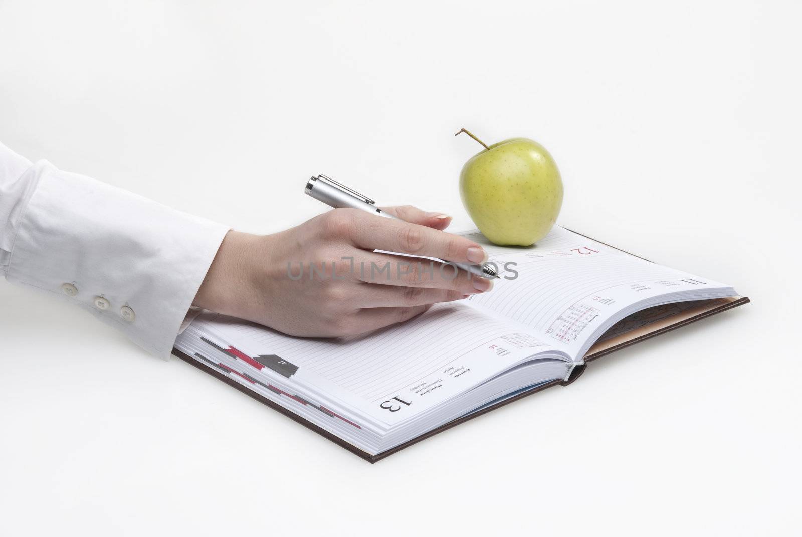 Woman hand making notes