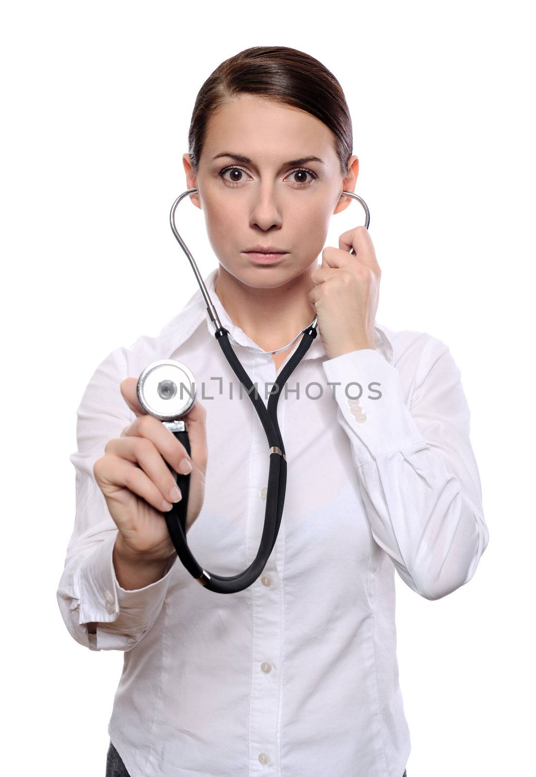 Strict female doctor listen with a stethoscope isolated on white background