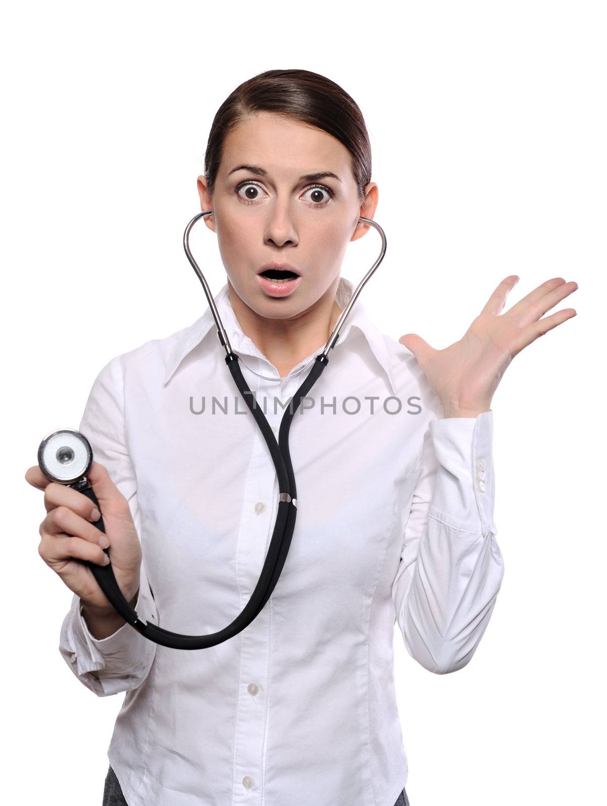 Doctor shocked - funny. Portrait of young female doctor or nurse surprised starring with big eyes. Isolated on white