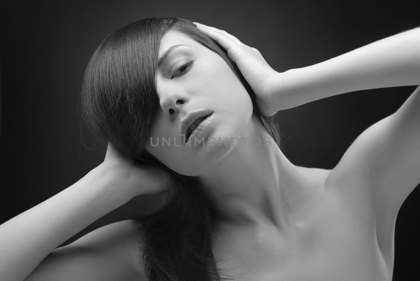 Black and white portrait of young beautiful woman