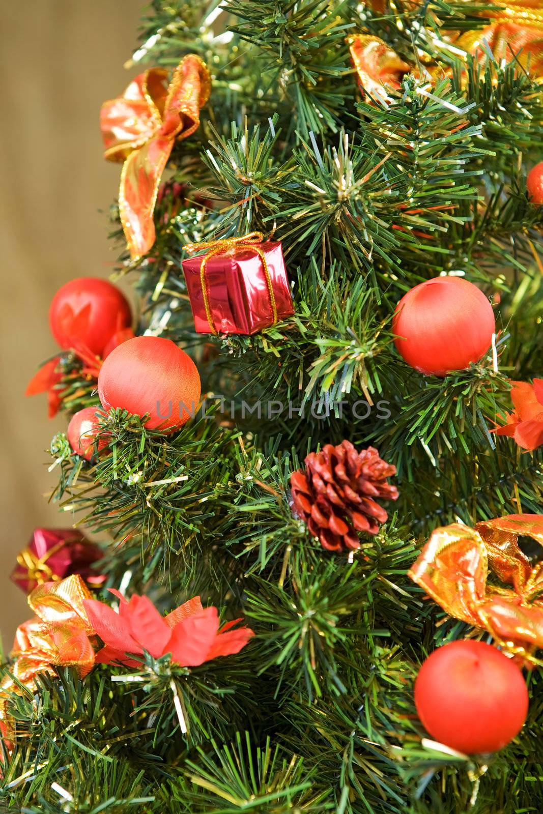 Red balls hanging on christmas tree