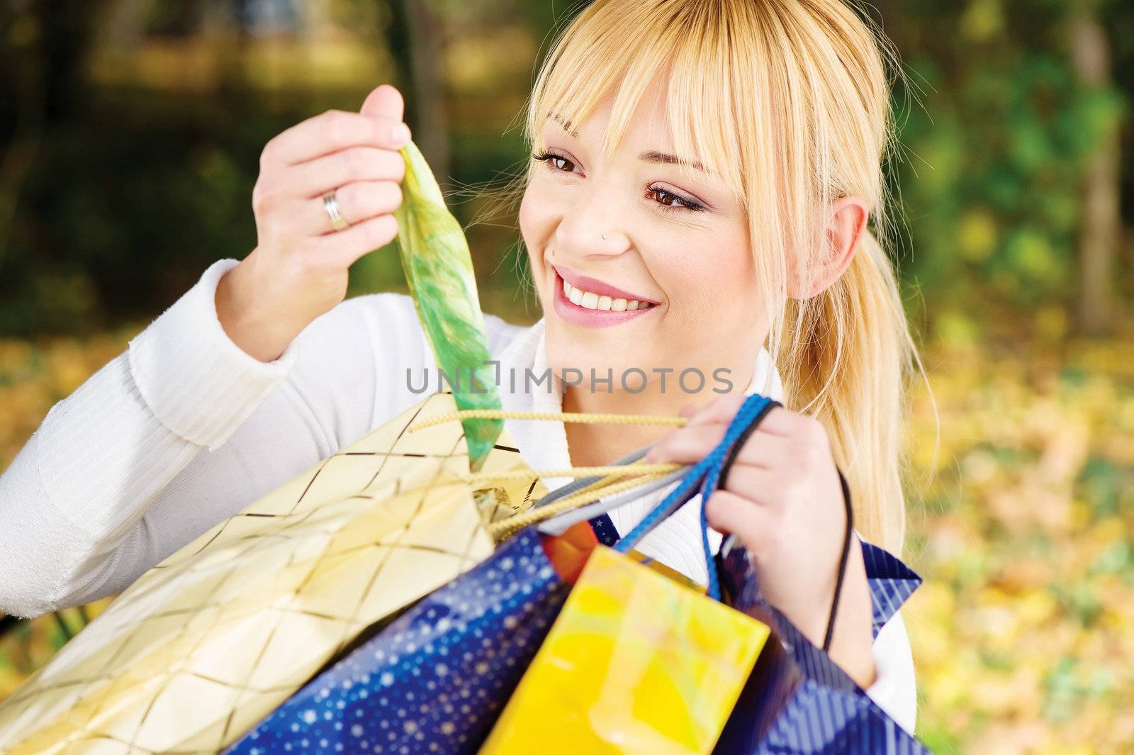 Checking out bag content after shopping, outdoor