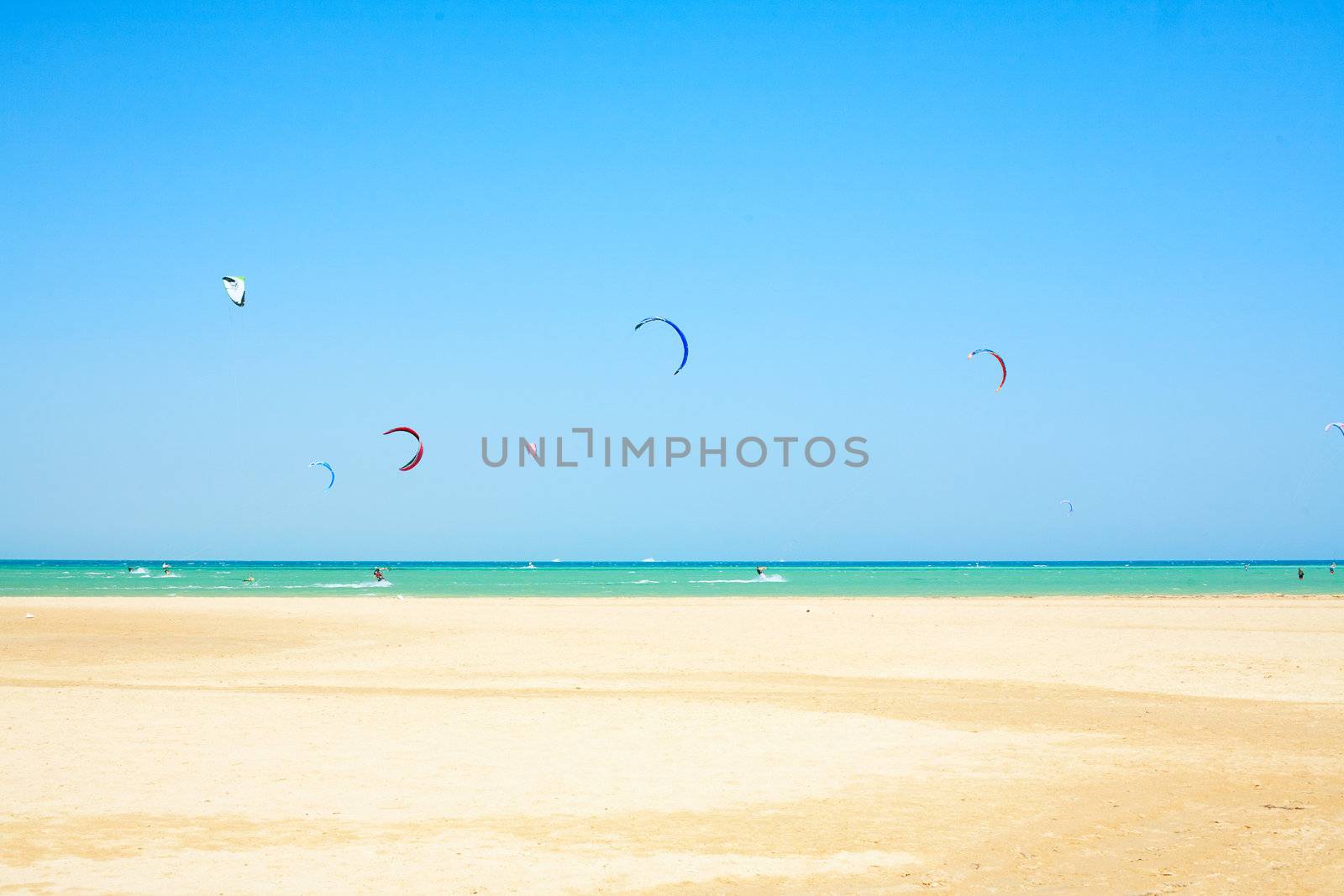 water sport on beach in Africa, kiteboarding