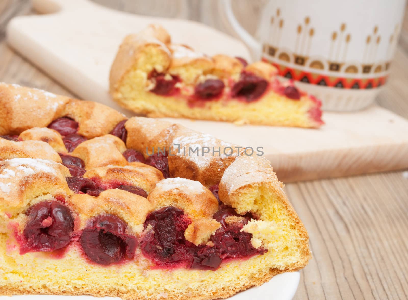 Homemade Cherry Pie and Mug on Wooden Table