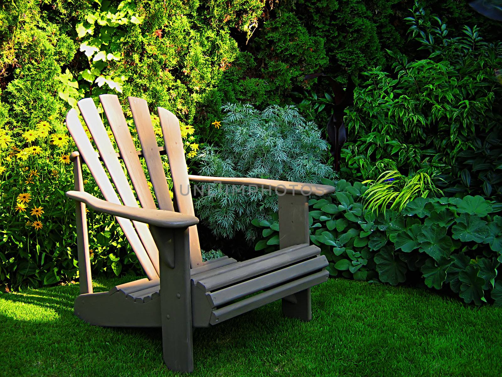 A photograph of a wooden lawn chair located in a garden.