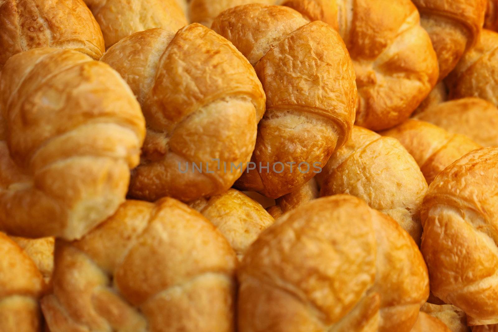 Croissants on tray - the background by pzaxe