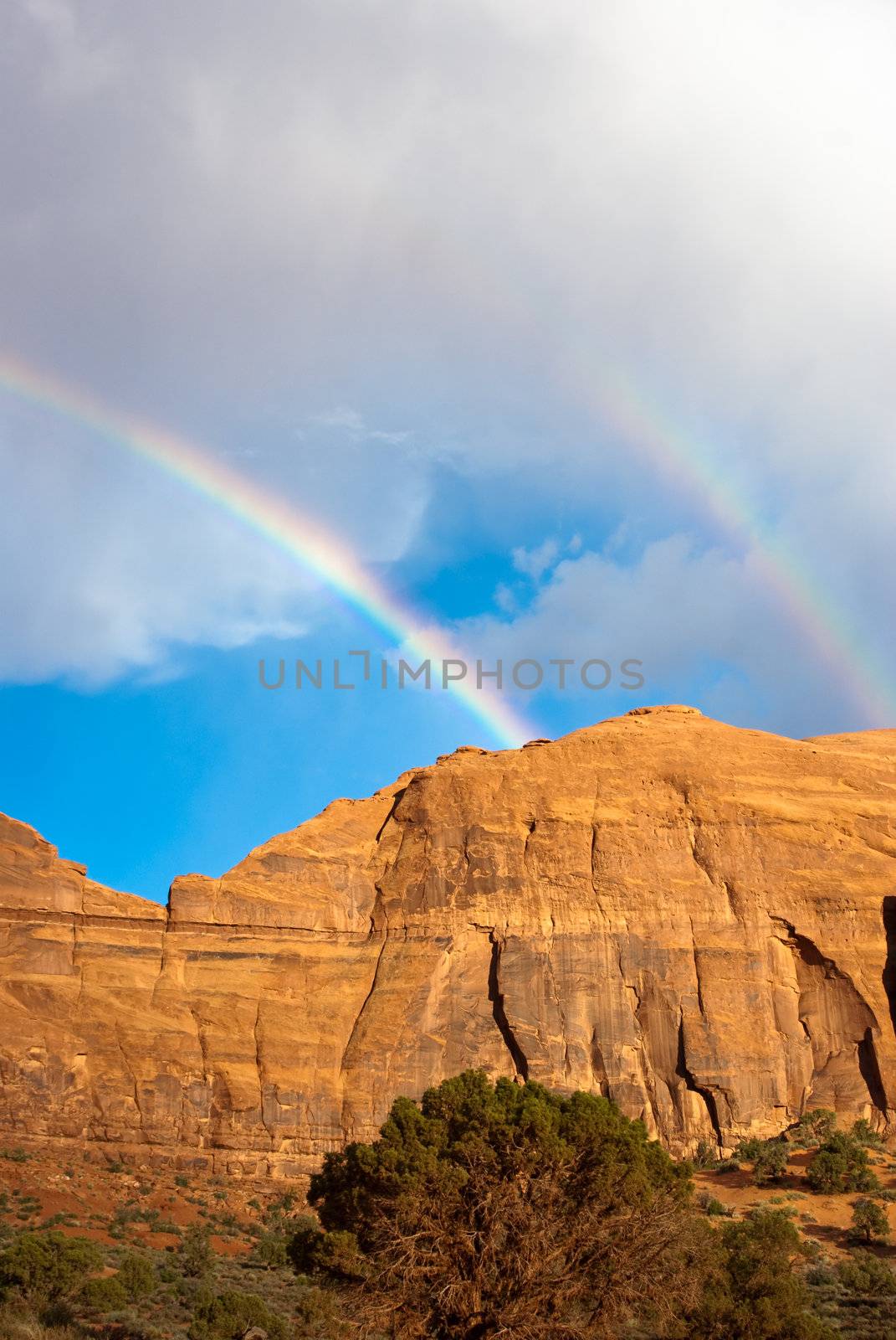 Double Rainbow over Monument Valley after a storm by emattil