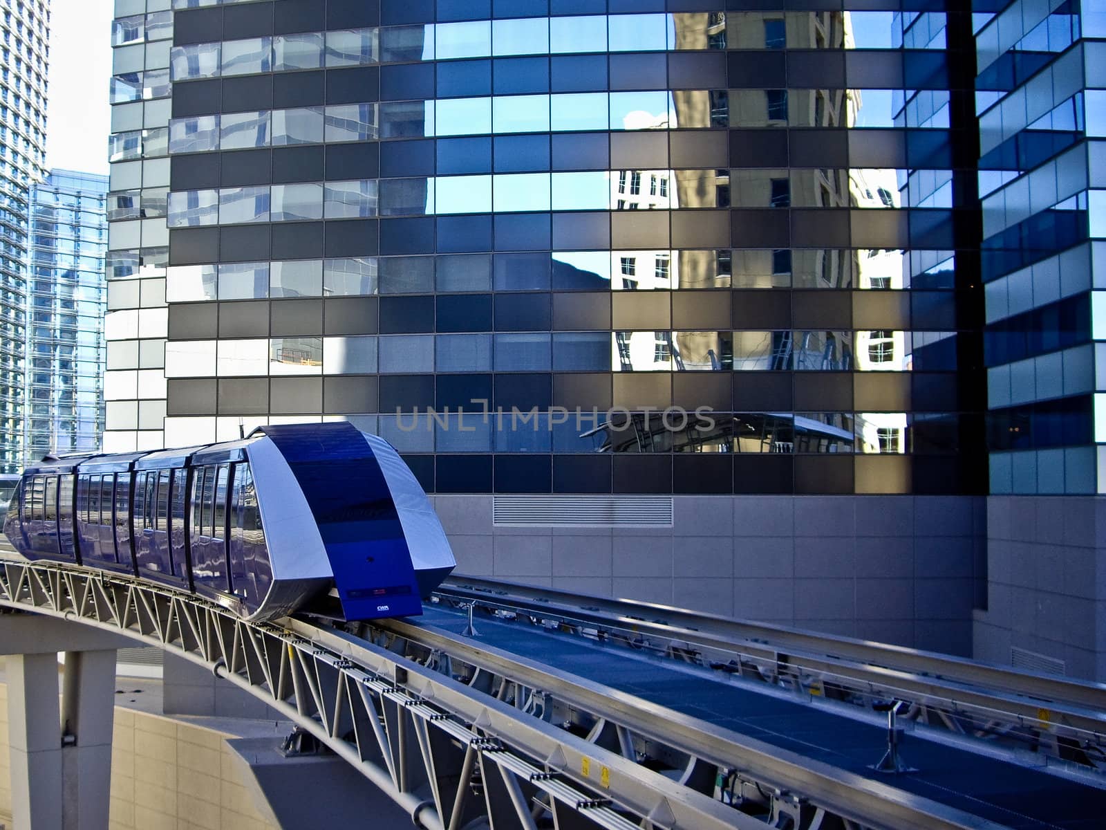 Monorail tram reflects distorted buildings Las Vegas, USA