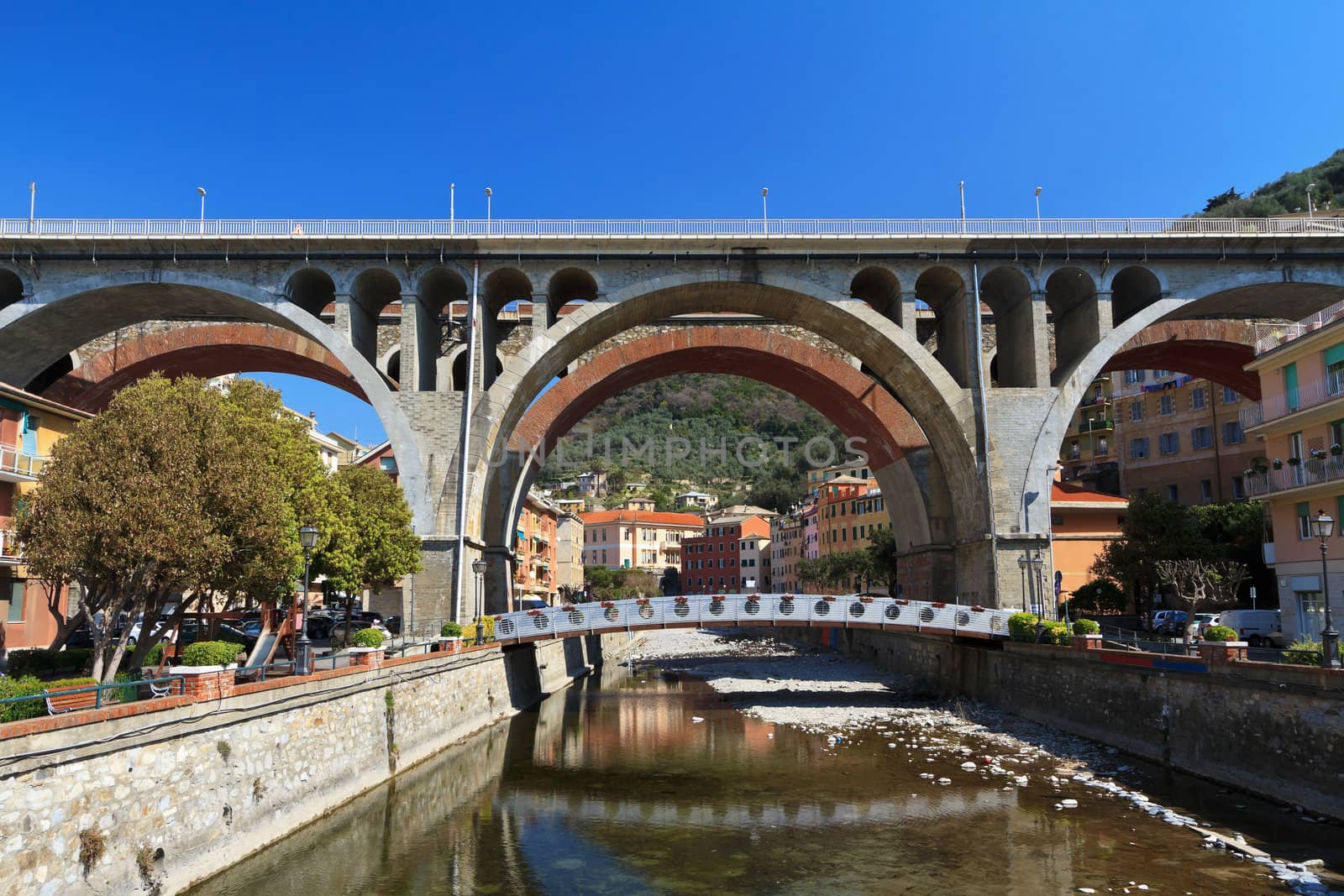 urban view in Sori with the road and the rail bridges over the town, Liguria, Italy