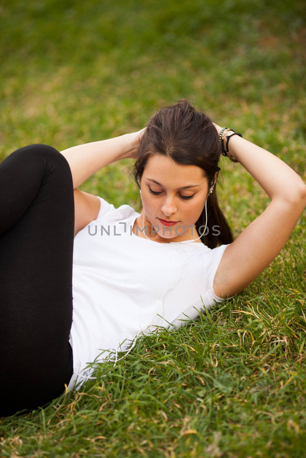 young beautiful latin woman making abs by Lcrespi