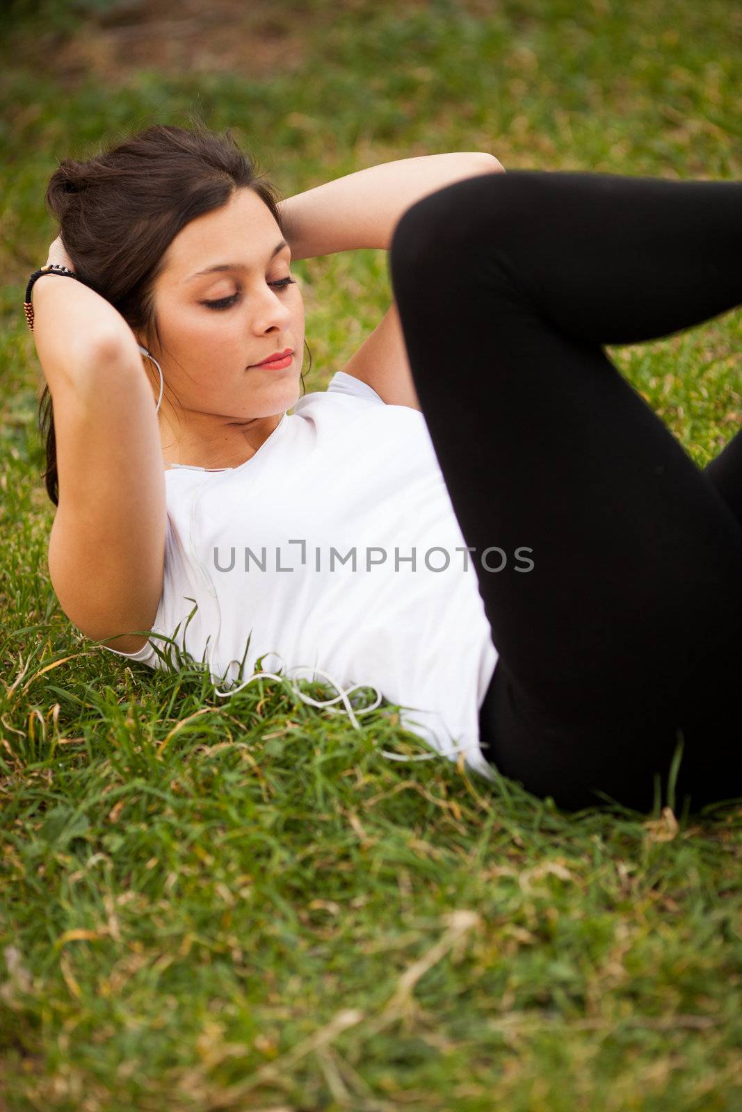 young beautiful latin woman making abs by Lcrespi